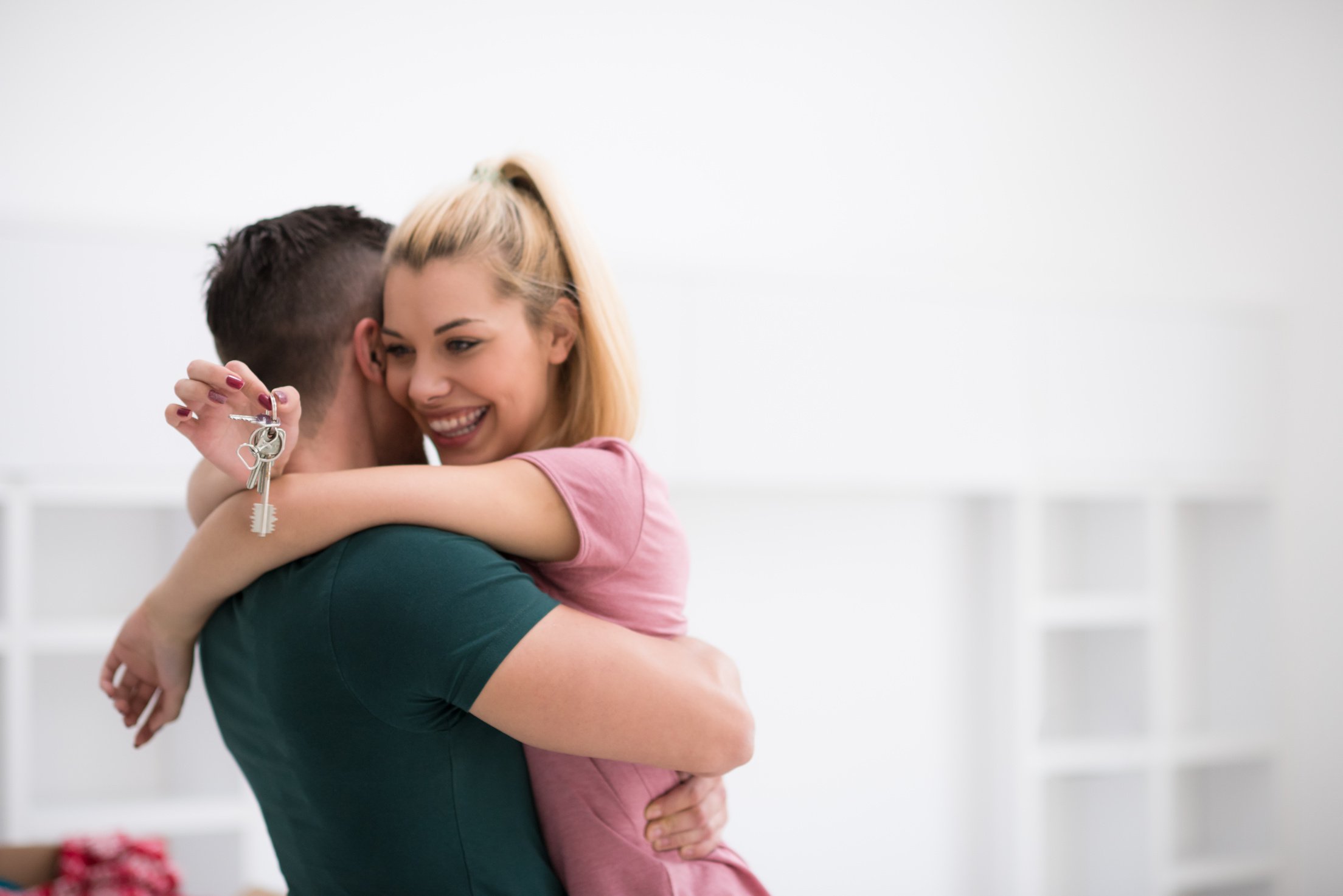 Happy Young Couple Moving in New House